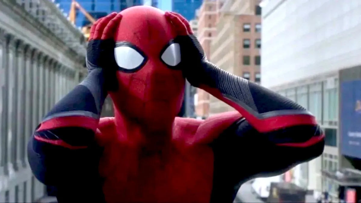 Spider-Man grasping the sides of his head in shock.